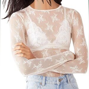 Long sleeve laced women’s shirts. Size medium. NWT. Two pack.